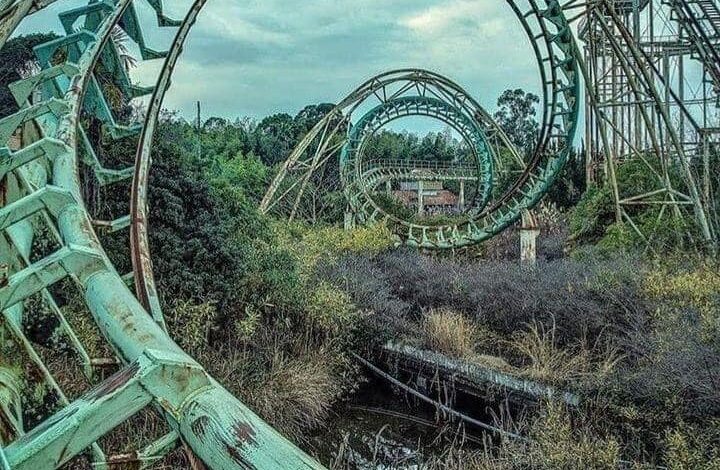 Rusting Tracks of Abandoned Rollercoasters in Old Amusement Parks